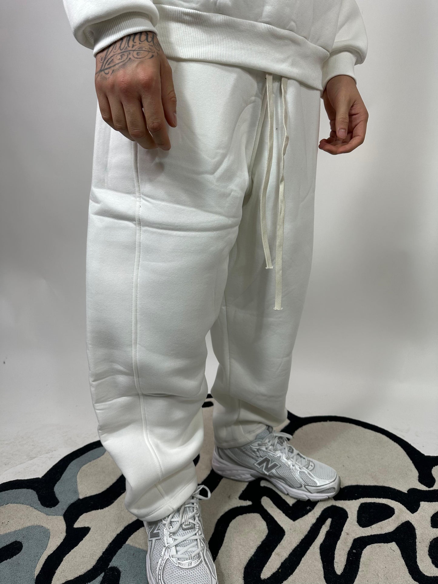 Pantalon ample à col montant et fermeture éclair en coton polaire blanc